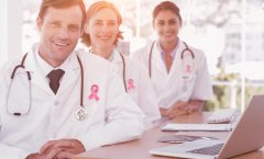 Composite image showing a breast cancer awareness ribbon